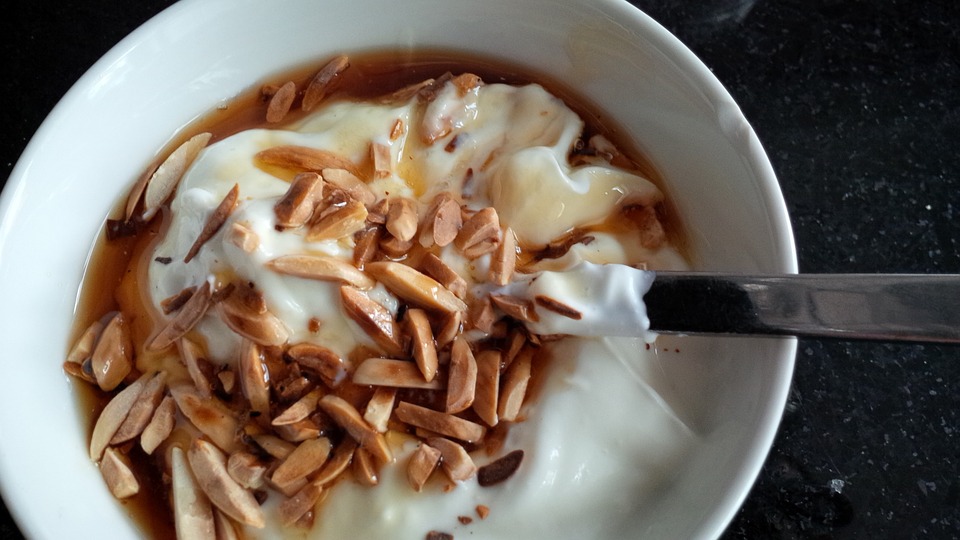 greek yogurt with almonds and maple syrup